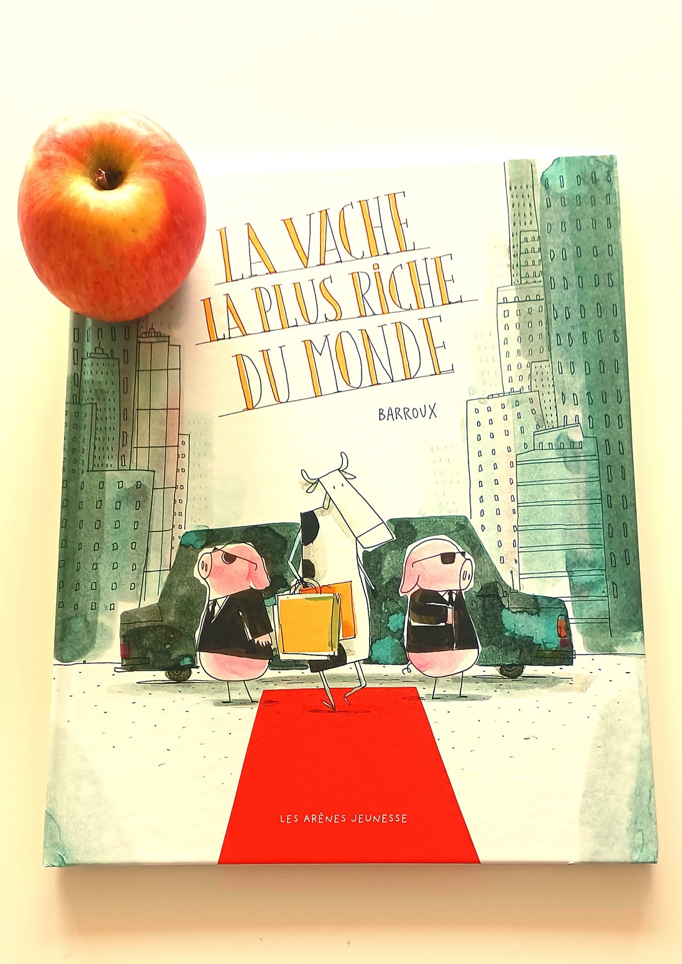 Une image contenant texte, livre, fruit, pomme Description générée automatiquement